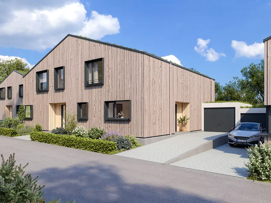 Moderne Reihenhäuser mit Holzfassade, Satteldach, Garage und gepflegter Einfahrt.