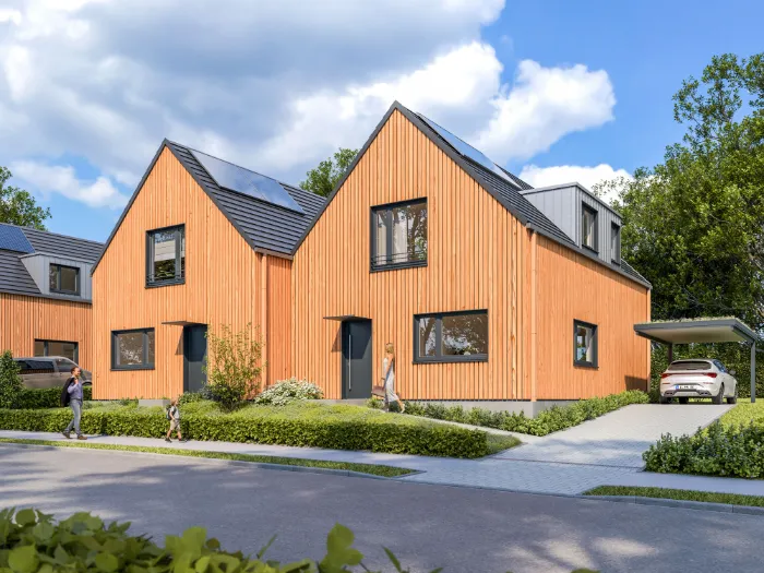 Moderne Doppelhäuser mit Holzfassade, Solarmodulen und gepflegtem Vorgarten in ruhiger Wohnstraße.